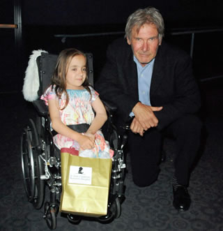 Harrison Ford and patient Elizabeth at the 30th anniversary screening of<em>The Empire Strikes Back</em> to benefit St. Jude
