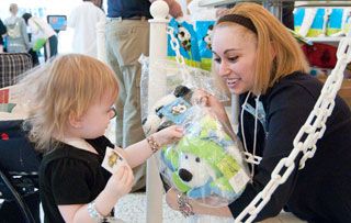 Kay Jewelers team members visited the hospital to distribute cuddly