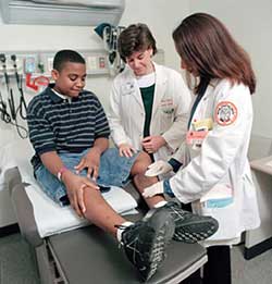 Medical students with patient