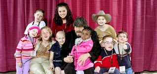 Randy Owen poses with St. Jude patients