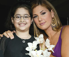 Daisy Fuentes with St. Jude patient Yiressy