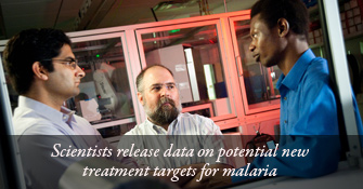 Kip Guy, PhD, with two of his lab members