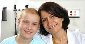 Sema Jeha with a St. Jude patient