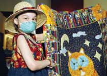St. Jude patient, Julie, and her quilt
