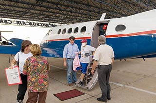 A patient from the devastated Gulf Coast region arrives in Memphis on Tuesday, September 6.