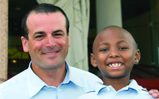 Beshara Charlie Nehme and St. Jude patient Nicholas