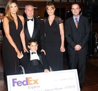 Daisy Fuentes presents a check to St. Jude.