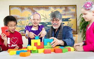 Randy Owen spends time with St. Jude patients during the 2011 Country Cares for St. Jude Kids radio seminar
