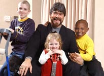 Randy Owen poses with St. Jude patients