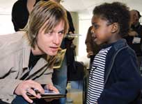Keith Urban signs an autograph for a St. Jude patient