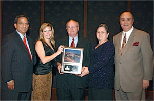 Charles Williams (center) was presented the ALSAC Volunteer of the Year Award in 2003.