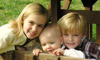 Volunteer Caroline Chase and siblings