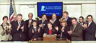 St. Jude patient rings the bell for Wall Street