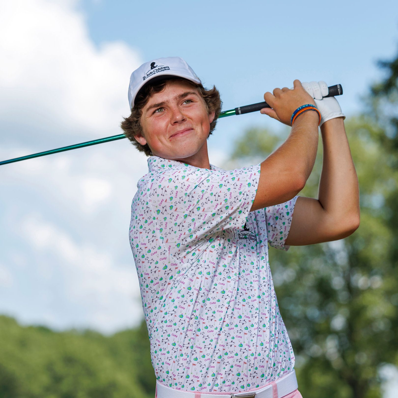 St. Jude patient Dakota playing golf