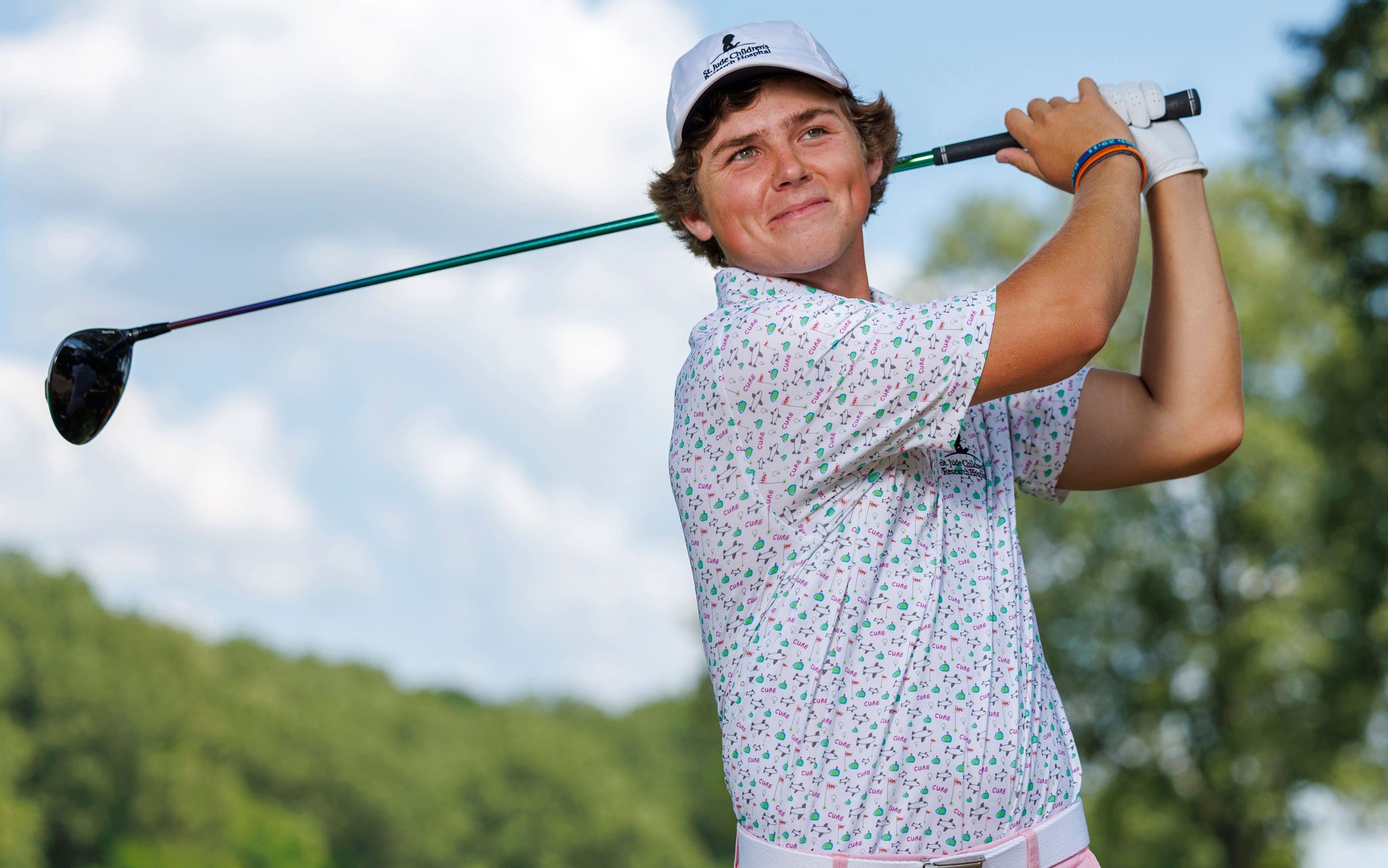 St. Jude patient Dakota playing golf