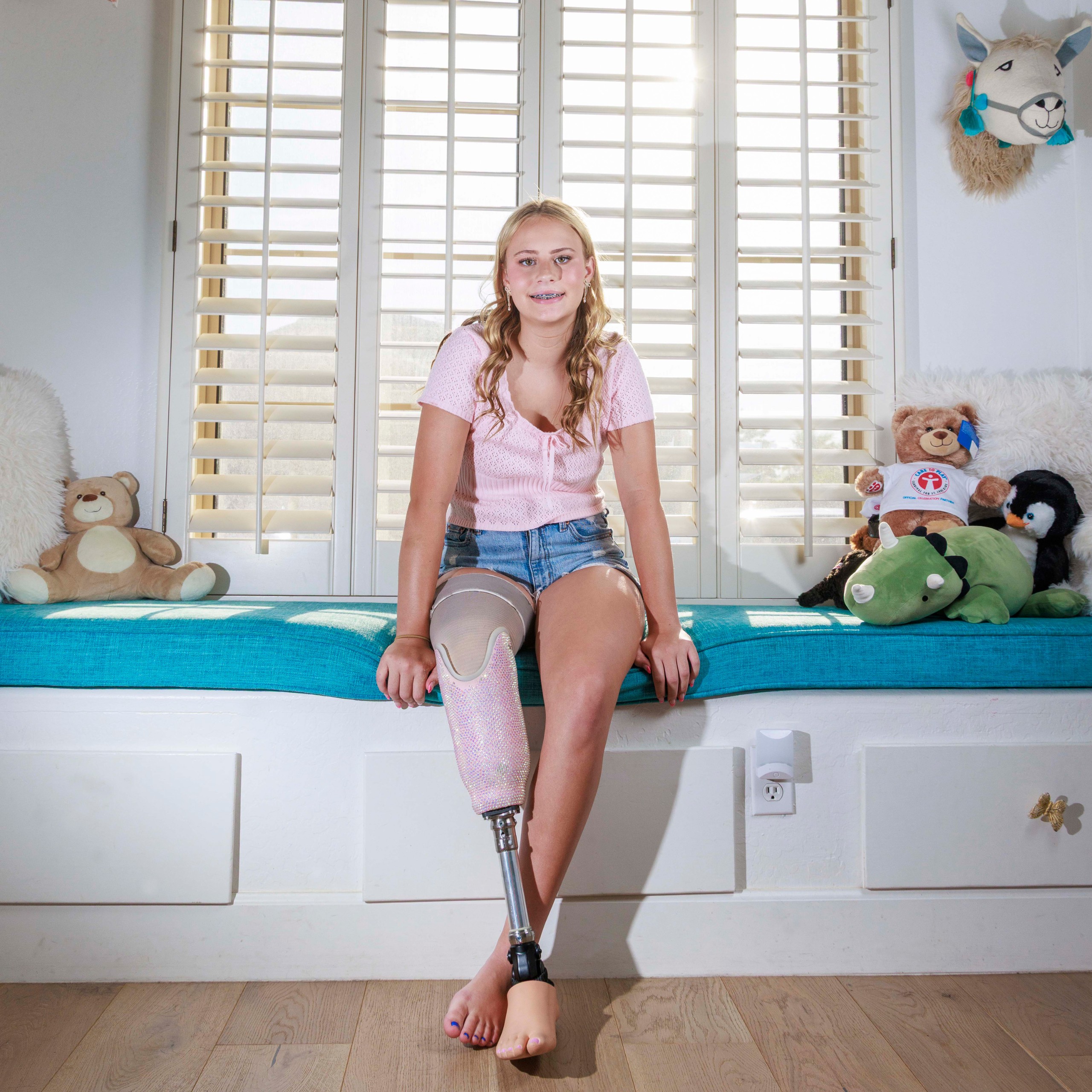 St. Jude patient Bridget sitting in her room