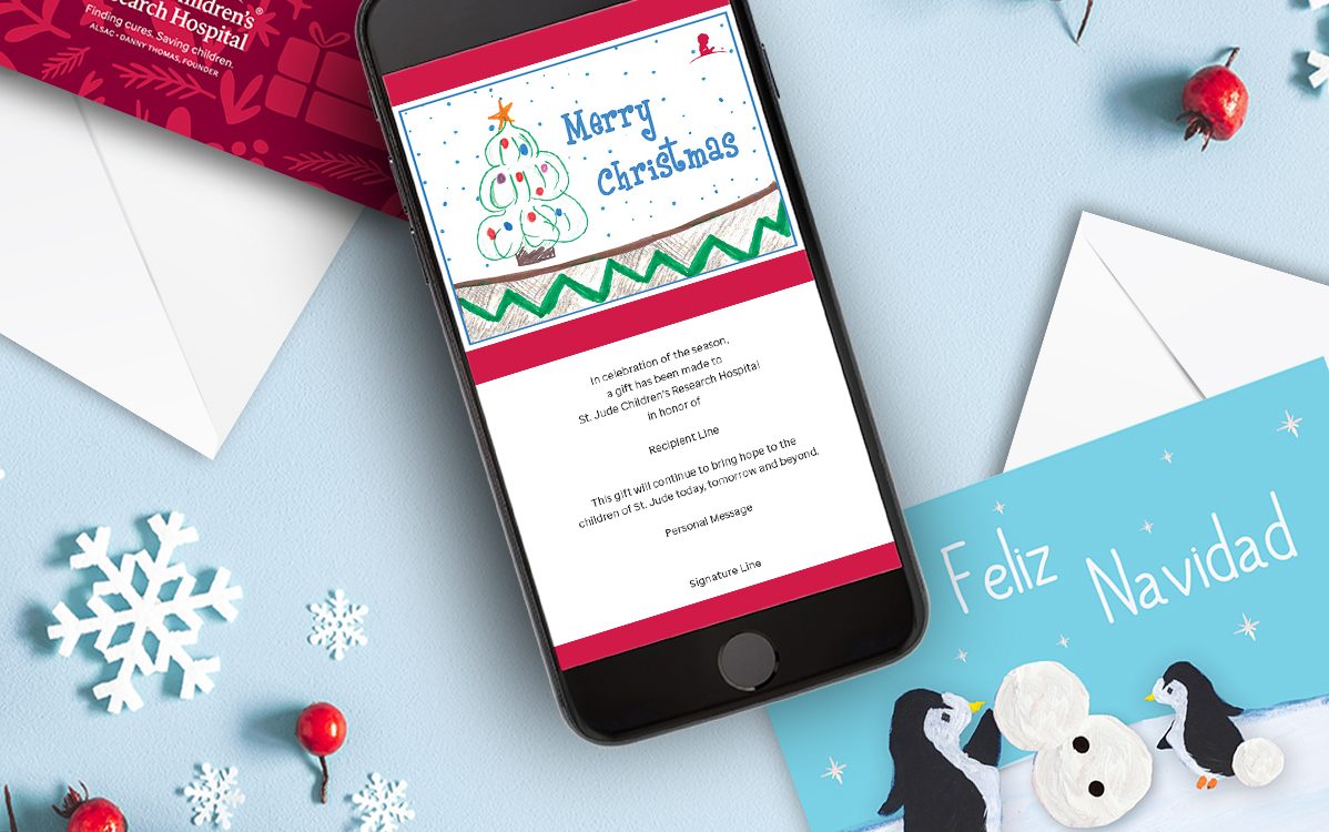 Festive scene featuring various greeting card designs for dedicating or honoring someone with a donation to St. Jude.