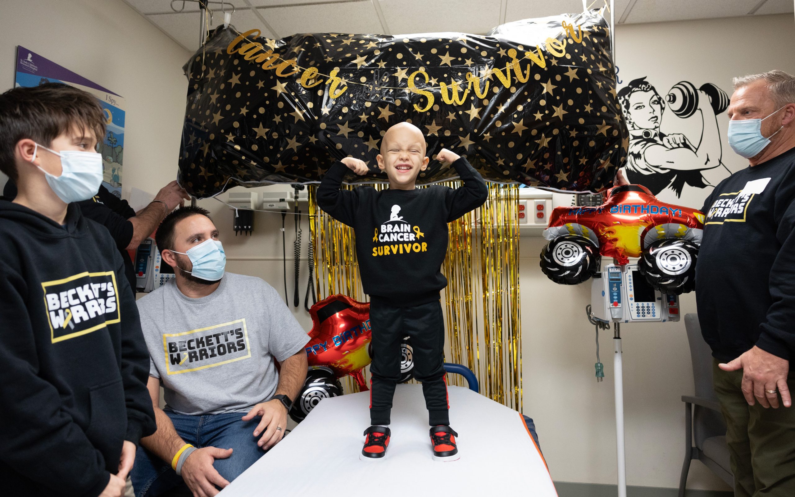 St. Jude patient Beckett celebrating after completing chemotherapy. Patients like him can be helped when you donate to cancer charity