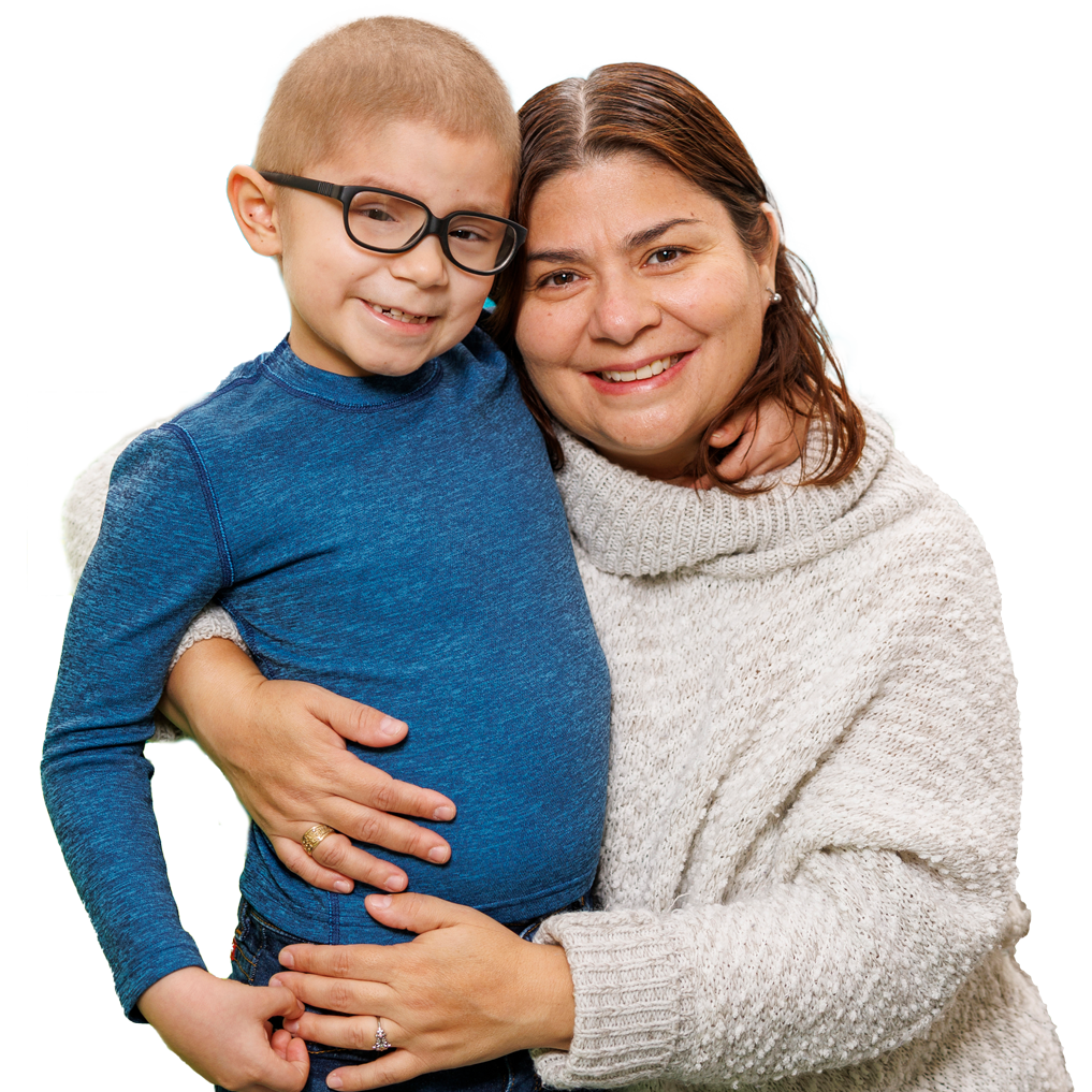 St. Jude patient Miguel hugging his mother