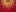Gold Middle Eastern design over a red background.