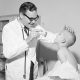 Luis Borella, MD, with a patient