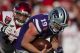Kansas State Wildcat #19 gets tackled.