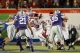 Arkansas Razorback #3 running with the ball.