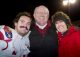 Arkansas Razorback posing with two people.