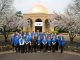 Best Buy employees smile in front of the Danny Thomas Pavilion.