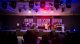 Erica Campbell and her band on stage.