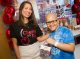 Carnival staff member Blanca Tasayo with St. Jude patient Jan Louis.