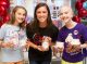 St. Jude patient Juliana, right, and her sister,left, enjoy some ice cream with a St. Jude intern.