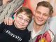St. Jude patient posing with country music singer