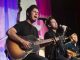 Dan + Shay singing on stage
