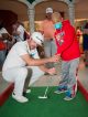 Boy putting on green