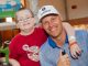 St. Jude patient Tyler with golfer Ben Crane.