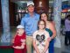 Group posing with professional golfer