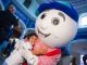 Boy hugging golf mascot