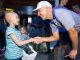 Patient and professional golfer shaking hands