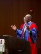 A member speaks at the graduate school convocation.