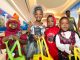 A Halloween princess and vampires trick or treat in the St. Jude hallways.