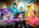 Monsters posing with a trick or treating patient