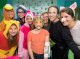 Winnie the Pooh and characters pose with St. Jude patient Tigger.