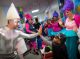 Guy Diamond from the movie Trolls high fives a trick-or-treating patient.