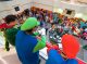 The Super Mario Brothers looked over the crowd from a balcony.