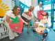 St. Jude patient Anderson dressed as Tow Mater gets candy.