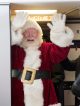 Santa Claus greets patients and families on the plane.