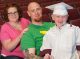 Graduating student with family