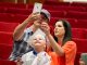 Family taking a selfie with the graduate.