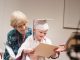 A graduate receiving their certificate.